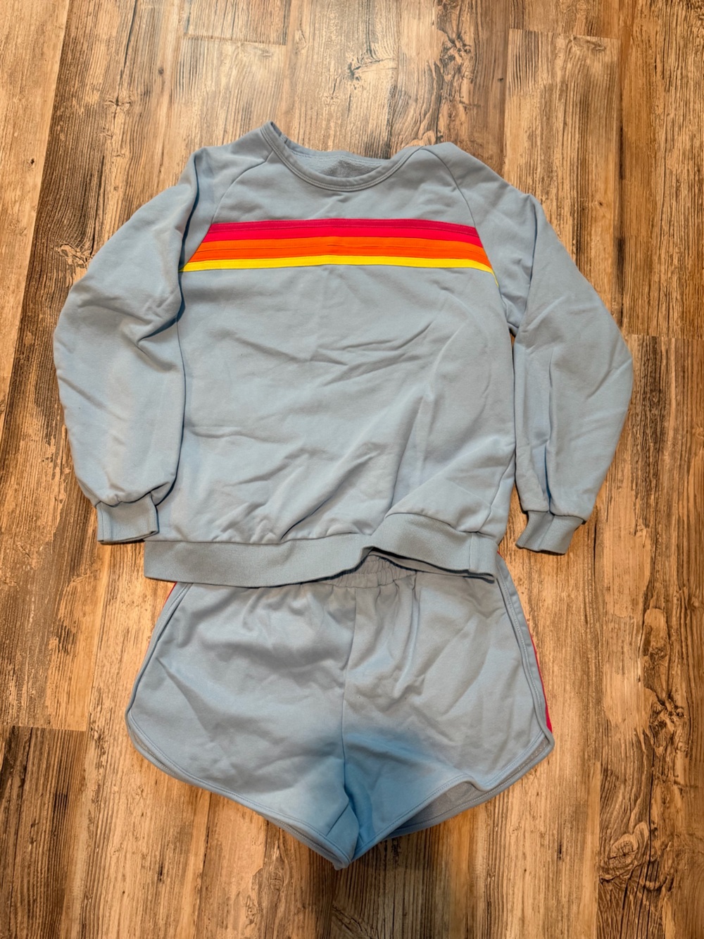 Light Blue Women's Crewneck Sweatshirt with Rainbow Stripe